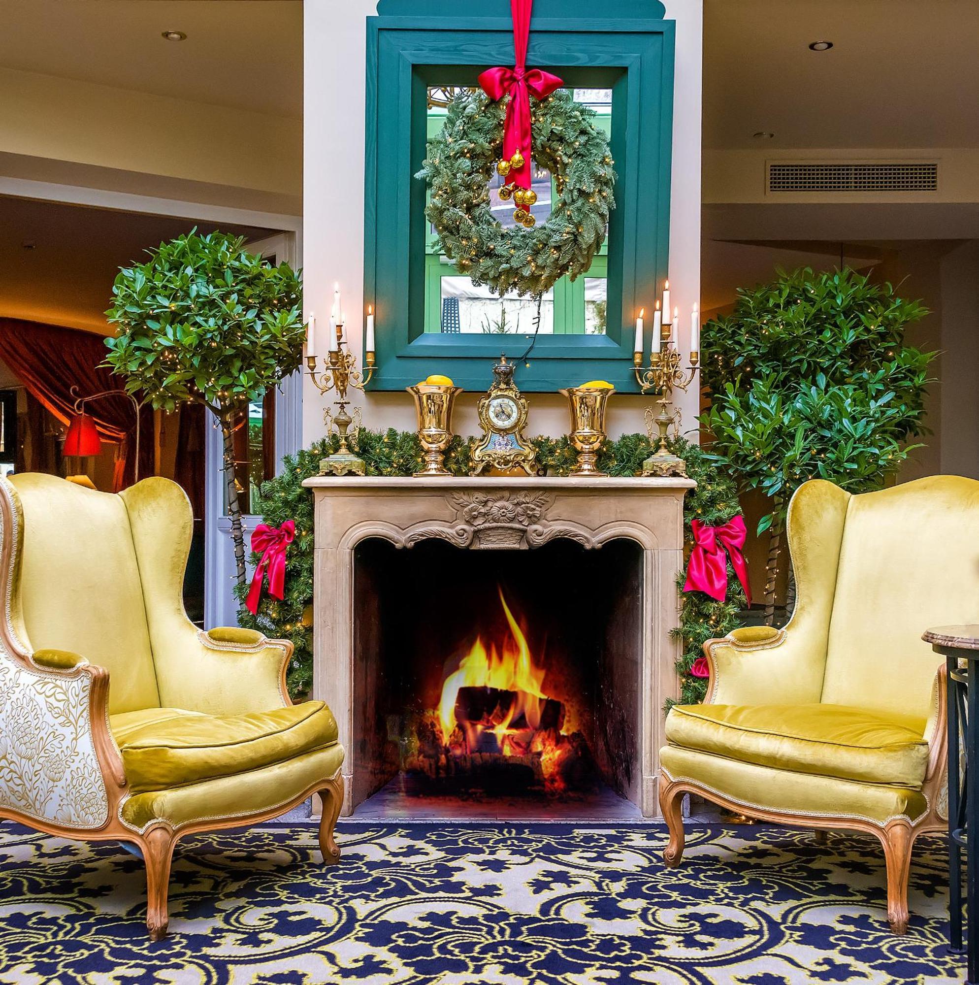 فيلنيوس فندق ريليه آند شاتو ستيكلياي المظهر الخارجي الصورة The fireplace in the lobby